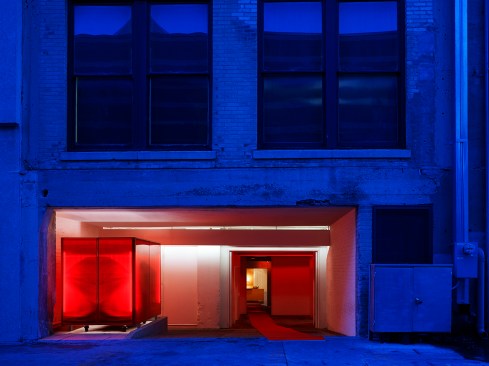 The+alley+entry+serves+as+the+primary+delivery+access+for+RED+Prime+Steak+Restaurant.++It+is+also+the+Ghost+Gallery+entrance.+For+events%2c+a+100%e2%80%99+red+carpet+rolls+out+from+the+alley+to+the+gallery.++A+red+polycarbonate+box+encloses+the+used+cooking+oil+container.