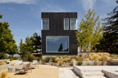 The two-story addition is clad&nbsp;in shou-sugi-ban (burnt&nbsp;Japanese wood).