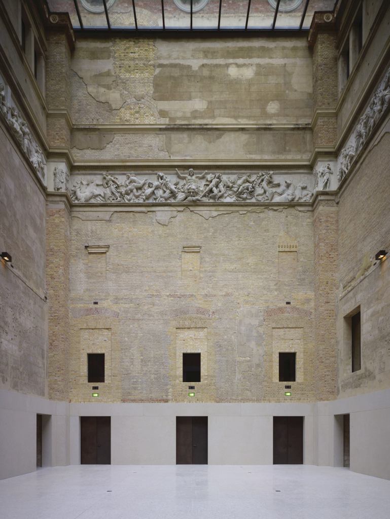 OPENING



In 1855, Prussian royal architect Friedrich August Stüler, a student of Schinkel, completed his best-known work, the Neues Museum on Berlin's Museum Island. Built to house the national antiquities collection, the museum was heavily bombed during World War II, and its neo-Pompeiian and Egyptian-revival interiors remained in a ruinous state until British architect David Chipperfield completed his unsentimental renovation last month. The building is momentarily open to visitors in an empty state, scars of war honestly exposed, before the antiquities go back on display.

smb.museum