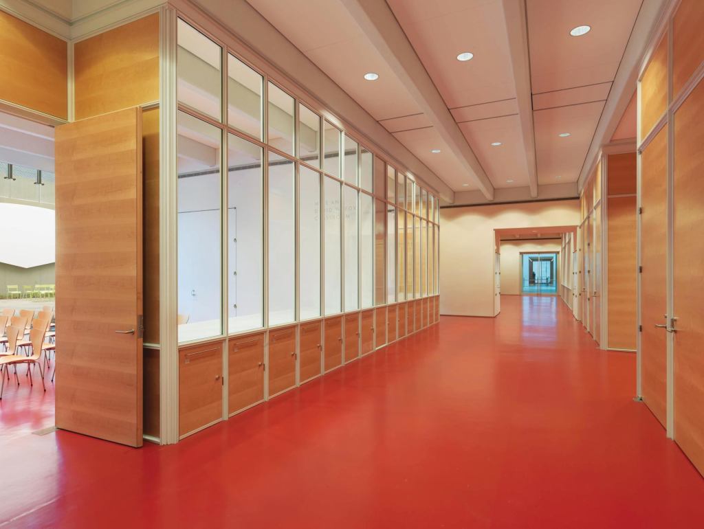 An alternative to traditional aluminum hollow metal frames for fire-rated applications, the Fireframes Aluminum Series from Technical Glass Products features custom extrusions and frames can be factory finished to match almost any color scheme. The system combines aluminum frames and doors with Pilkington Pyrostop glass to form a barrier against radiant and conductive heat transfer, allowing wide areas of glazing in fire separations. The system carries a 60-minute fire rating as a wall assembly and may offer 20-, 45-, or 60-minute ratings for doors. It also helps maintain clear lines of sight throughout interior spaces, permitting natural light to reach far into a building. fireglass.com