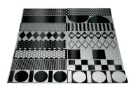 Lasertrons etched stainless steel backsplashes start as a single piece of mirror-finish stainless steel. During the manufacturing process, pattern outlines are masked and the exposed area is brushed with an abrasive. No toxic chemicals are used. Geometric patterns include squares, circles, and diamonds. Panel sizes can be made up to 48" by 96". ¢ lasertrondirect.com