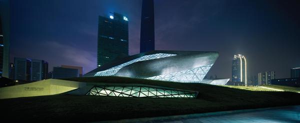 Supported by a steel framework, the structural skin features a series of triangular panels?white and black granite (75,422 pieces in all) and glass.