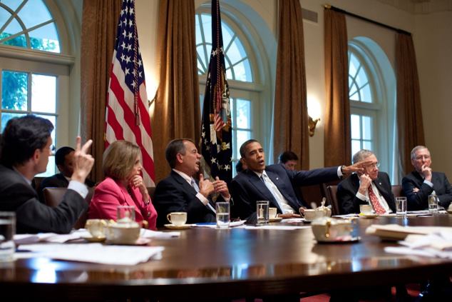 Rep. Eric Cantor, Rep. Nancy Pelosi, Rep. John Boehner, President Barack Obama, Sen. Harry Reid, and Sen. Mitch McConnell participating in a budget meeting in July 2011.