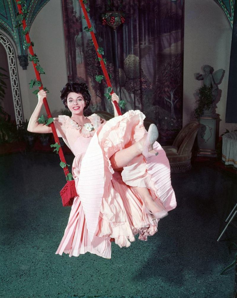 Joan Collins in the 1955 film, ''The Girl in the Red Velvet Swing.''
