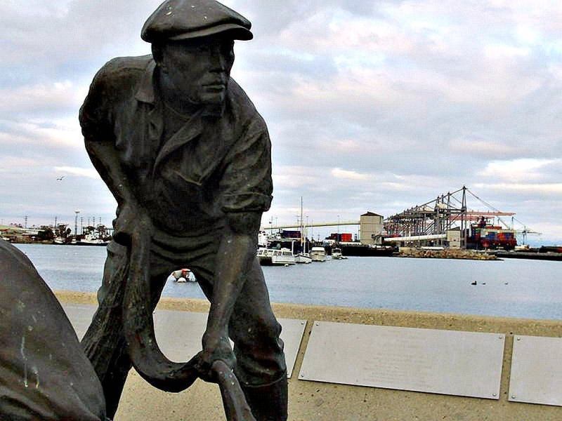 Fisherman Statue with view of Long Beach Port