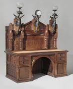 Desk, designed by Frank Furness, American, 1839-1912. Possibly made by Daniel Pabst, American (born Germany), 1827-1910. Philadelphia, c. 1875, Walnut, white pine, maple, poplar, with clock and lamp mounts and glass globes. Made in Philadelphia; gift of George Wood Furness, 1974.
