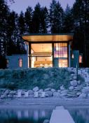 Tom Kundigs take on the casual lake lifestyle was a tough concrete box that can be left out in the weather without maintenance.