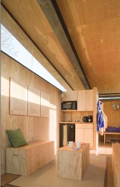 On these updated Thoreau huts, clerestory windows bring in views of the mountains while ensuring privacy between units. 