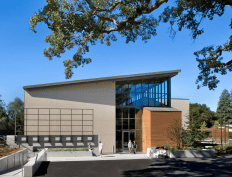 closed music rooms and open studios are expressed by the exterior geometry.