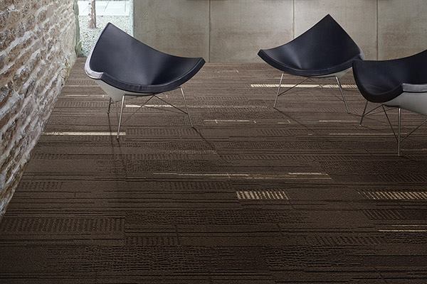 Inspired by the natural simplicity of un-dyed wool and linen, Duo and Trio from Interface can be laid out in several patterns, including herringbone and linear designs. When installed in an ashlar coursing, the 25cm-by-1m plank tiles take on a seamless, broadloom-like look. Duo and Trio are made entirely from non-virgin yarn that is combined with reclaimed carpet fiber and salvaged fishing nets. interface.com