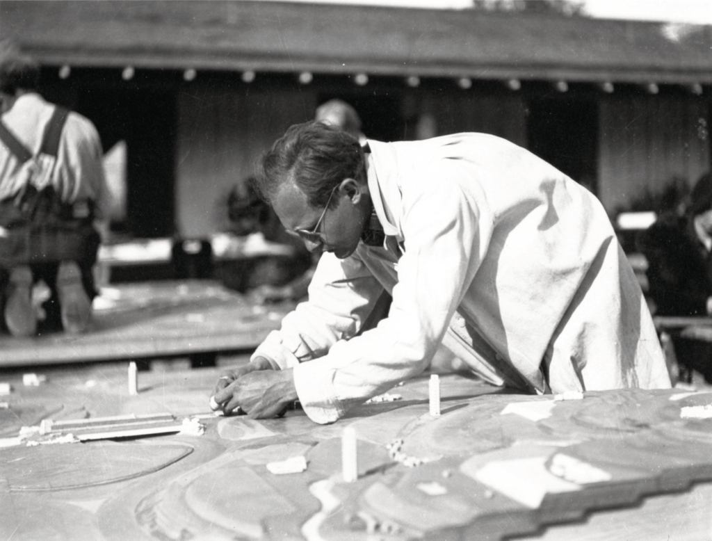 A Taliesen fellow in Chandler, Ariz., works on a 1935 model of Wright’s Broadacre City development scheme, which sought to bring urban density to suburbia. 