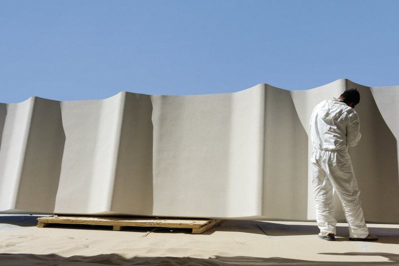 A worker at Kreysler & Associate’s shop, in the San Francisco Bay Area, finishes a Fireshield 285 panel, which will be installed at the San Francisco Museum of Modern Art.
