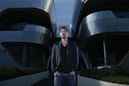 Alvin Huang in front of “The Groove” at CentralWorld, a 129,167-square-foot entertainment and retail venue his firm completed late last year in Bangkok.