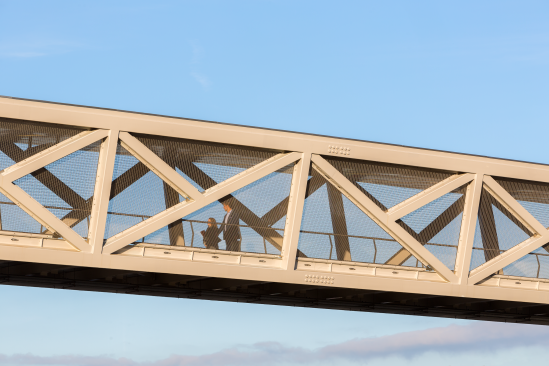 The pedestrian bridges connect metro stations to parking lots – helping commuters cross busy roads more safely.