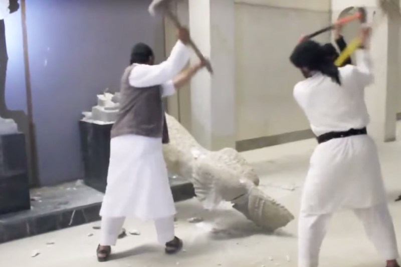Still from a video that ISIS produced and distributed, showing its destruction of artifacts in a Mosul, Iraq,&nbsp;museum.