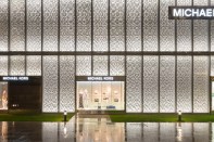 Narrow optic wall grazers are located at the top and
bottom of each panel and are coordinated with the reflector angles to create a
sense of depth using a pattern of light and shadows across the fa&ccedil;ade.