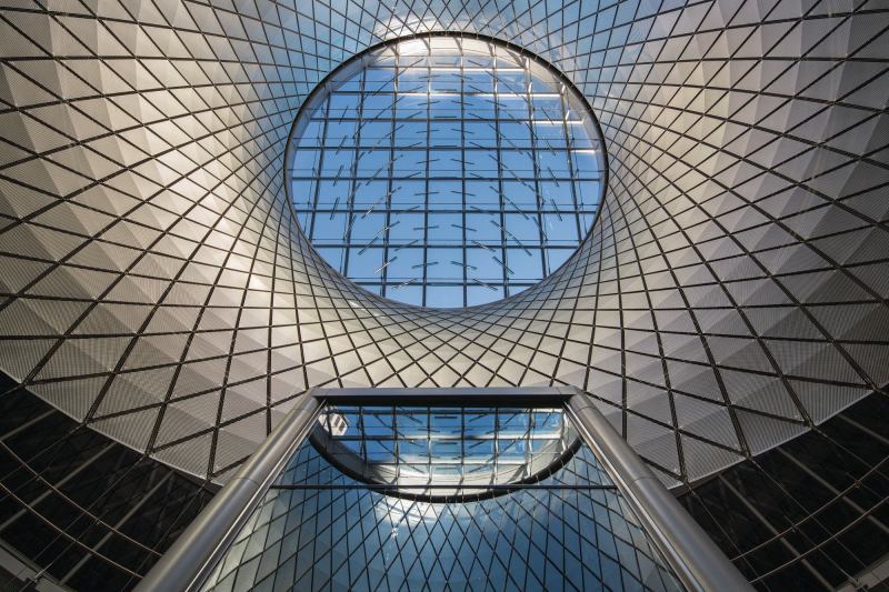 Sky Reflector-Net, a 79-foot-tall sculpture, harnesses natral light and brings it deep into the Fulton Center in Lower Manhattan.