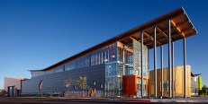 The Amazeum's lobby roof transitions from a stacked structural system of girders and beams inside to a composite structure in the entrance canopy, where the structural members are in one plane.