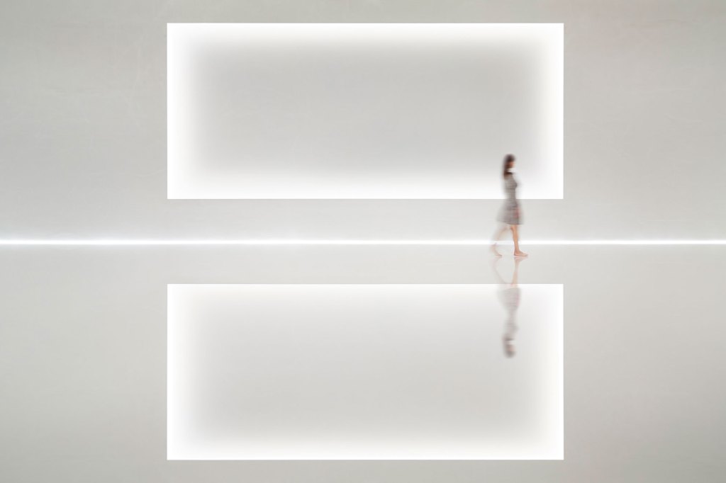 A recessed screen surface is softly framed by a carefully detailed knife-edge cove, hiding the light source from view even at the shallowest viewing angles.
