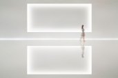 A recessed screen surface is softly framed by a carefully detailed knife-edge cove, hiding the light source from view even at the shallowest viewing angles.
