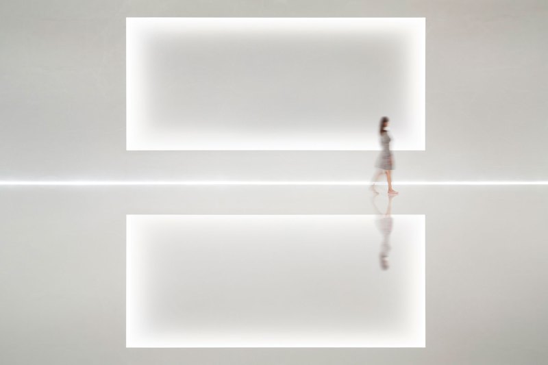 A recessed screen surface is softly framed by a carefully detailed knife-edge cove, hiding the light source from view even at the shallowest viewing angles.