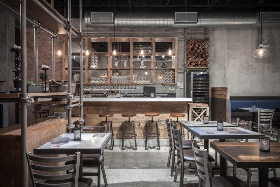 The 80-person restaurant features dining area, pizza bar, wine bar and wine cellar.