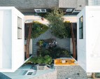 Residents can relax in the landscaped courtyard between the two duplexes.
