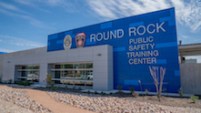 Drawing respectful inspiration from the uniforms worn by the first responders trained at Round Rock Public Safety Training Center, blue and gray panels clad the building’s facade.