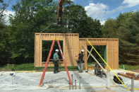 Threshold Builders' panels are set on the jobsite.