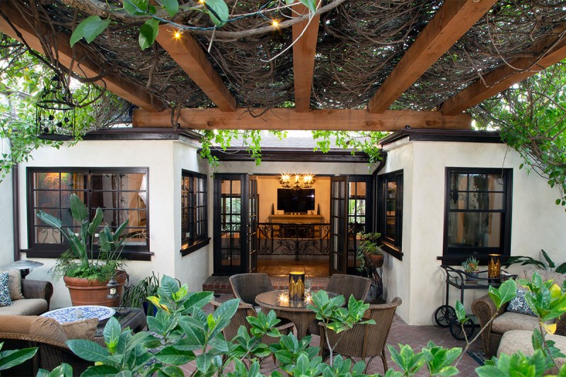 Nestled in the Hollywood Hills, this Rancho-style home first built in 1925 received an outdoor living upgrade using Redwood timbers.