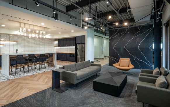 The public-facing part of the office comprises reception, large conference room, video production room, lounge, galley kitchen, and outdoor patio.