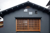 The new large lattice screen covers several new windows. A few gable windows were also added.