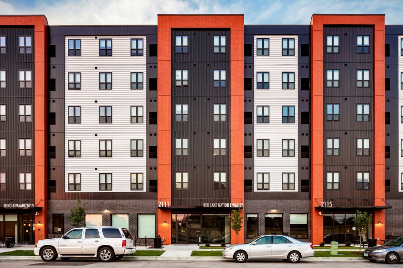 The custom wood grain finish on the façade of the Mino-Bimaadiziwin Apartments reflects the cultural link between the Red Lake Reservation and Minneapolis’ American Indian Cultural Corridor.
