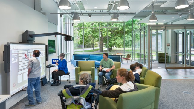 Technology in the student
center includes a smart
board, televisions with
video game consoles, computers,
handheld devices,
musical instruments and
radio equipment.