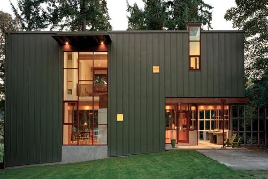 Straddling its long and narrow site, the Roddy/Bale Garage maintains a low profile to permit full visual access to the complementary main house.