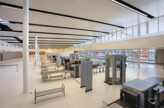 The security area was designed to be larger than is required by current Transportation Services Administration guidelines. This anticipates future changes to security screening that might require more or larger equipment, and will allow the screening area to be expanded or reconfigured without infringing on the surrounding spaces.  Wall finishes CL Coatings Interior Latex Paint nacoatings.com  Wall Board USG DensDeck, Type X gypsum board, abuse resistant board, glass-mat board usg.com  Wall Finishes Sobotec Limited Alucobond metal wall panels sobotec.com
