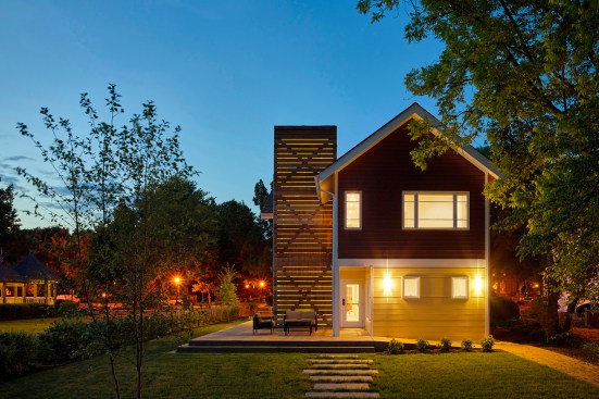 Rear of house with community patio and large activity yard