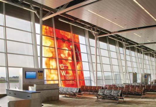 The arrival and departure gates are located down the two arms of the building that extend back from the main concourse. Here, HOK looked at choosing materials with high recycled content?including carpeting and wood finishes. All adhesives, sealants, paints, and coatings are low VOC.  Area Lighting Pinnacle Architectural Lighting Recessed and suspended fluorescent fixtures pinnacle-ltg.com  Art Glass BGT Bischoff Glastechnik AG Custom laminated fritte glass bgt-bretten.de  Seating Herman Miller Eames Tandem Sling Seating hermanmiller.com