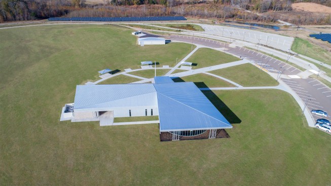 The radial site plan, responding to the geometry of the solar farm, creates a compact campus of related structures.
