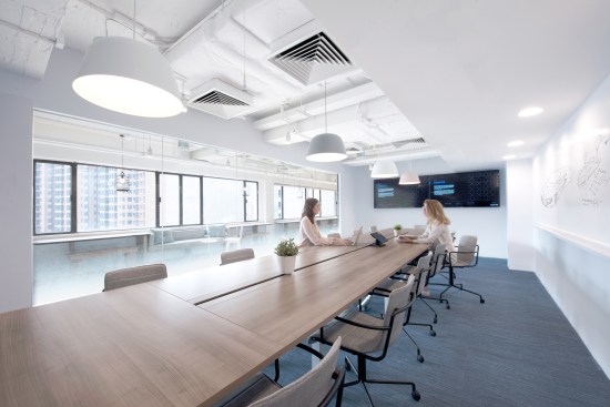 Internal view of the main meeting room with writable walls that encourages the staff to creatively express themselves