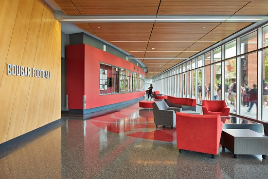 Students use the elevated west walkway daily and in doing so, experience the Hall of
Fame through large expanses of glass.