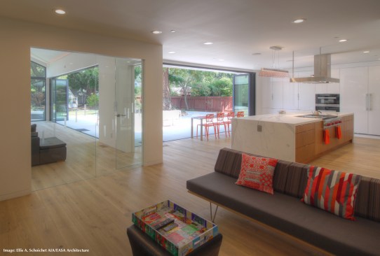 After- View from Living Room to rear yard (doors open)