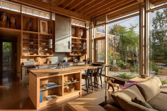 A 2,700-year-old fir tree forms the kitchen island’s countertop.