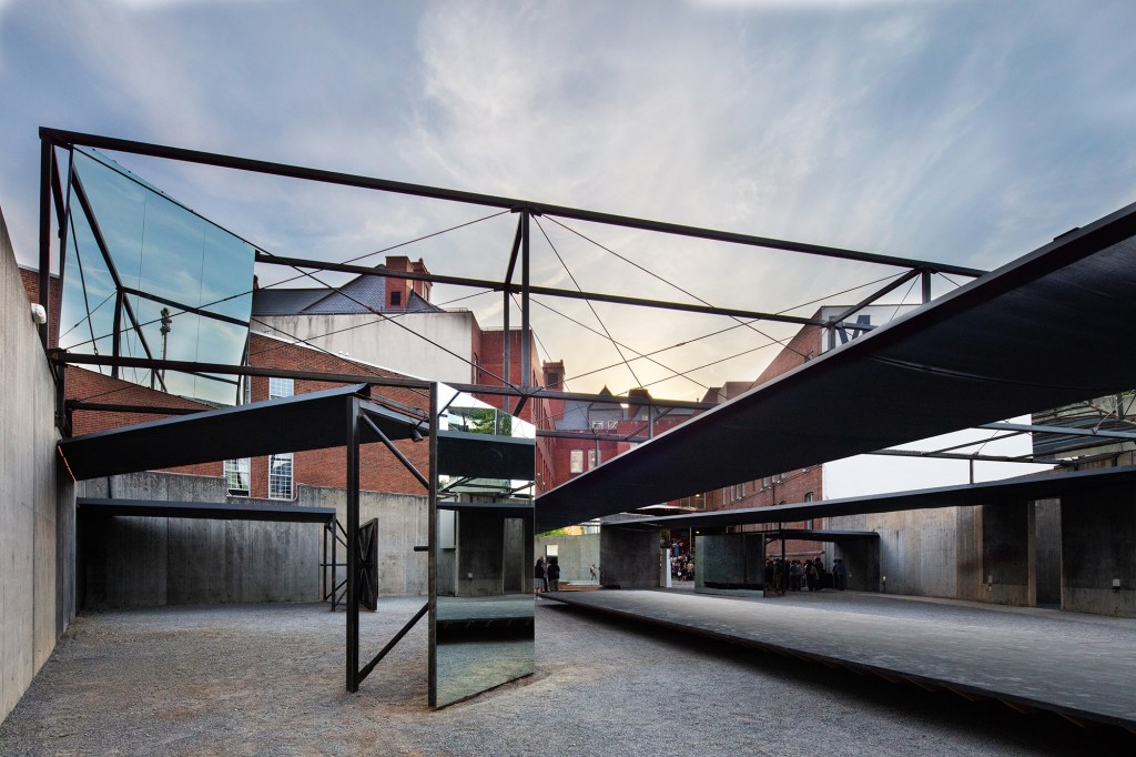 Runway in largest courtyard, covered by mesh canopy