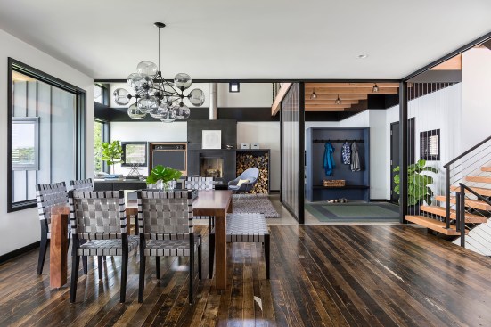 Modern house showing dining room and view into living room