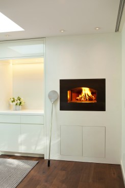 Remodel of Edina Mn residence, PK architects, Streeter and Associates, Andrew Flesher Interiors, ©Karen Melvin Photography, modern, contemporary, white, white kitchen, pizza oven, fireplace modern, monochromatic, woods, woodfloor, modern lamps, feather chandelier, feather pendant, poolside, Womb Chair, wire chair, remodel, remodel modern, architecture minnesota, AM cover