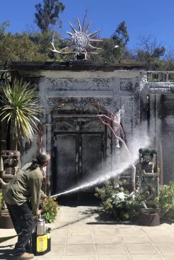 Treating vulnerable structures at Xanabu with wet water, a Class A fire-retardant compressed air  foam, by Tri-Max