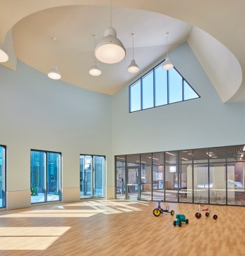The childcare center features LVT plank flooring in a wood finish.