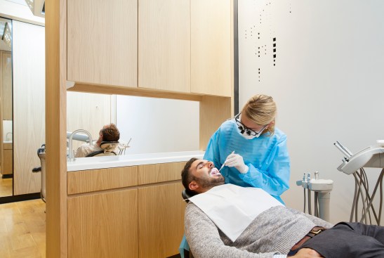 Photograph Copyright Mitch Tobias www.mitchtobias.com (415) 647-0242Interiors and exteriors of Studio Dental, a mobile dental office in San Francisco.  Dentist with patient.
