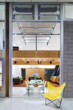The homeowners  program demanded a minimalist space with an honest expression of its structure and materials.